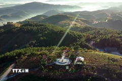 Cột mốc ngã ba biên giới ơ Bờ Y (Quảng Ngãi). (Ảnh: Cao Nguyên/TTXVN)