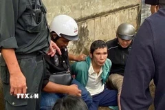 Nghi phạm Nguyễn Nam Đại Thuận bị công an bắt giữ. (Ảnh: TTXVN phát)