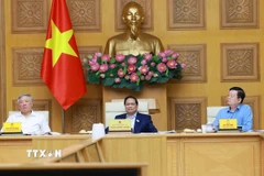 Thủ tướng Phạm Minh Chính chủ trì họp triển khai Triển lãm thành tựu của đất nước nhân dịp kỷ niệm 80 năm Quốc khánh. (Ảnh: Dương Giang/TTXVN)