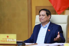 Thủ tướng Phạm Minh Chính chủ trì họp triển khai Triển lãm thành tựu của đất nước nhân dịp kỷ niệm 80 năm Quốc khánh. (Ảnh: Dương Giang/TTXVN)