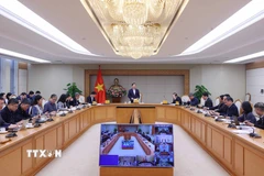 Phó Thủ tướng Trần Hồng Hà chủ trì cuộc họp nghe báo cáo hoàn thiện dự thảo Nghị định về một số chính sách phát triển thủy sản, kết nối trực tuyến với điểm cầu của 6 tỉnh, thành phố ven biển. (Ảnh: Văn Điệp/TTXVN)