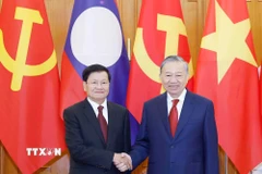 Tổng Bí thư Tô Lâm hội đàm với Tổng Bí thư, Chủ tịch nước Lào Thongloun Sisoulith. (Ảnh: Thống Nhất/ TTXVN)