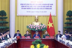 Quang cảnh Họp báo Công bố Lệnh của Chủ tịch nước Cộng hòa xã hội chủ nghĩa Việt Nam công bố các luật, pháp lệnh đã được Quốc hội, Ủy ban Thường vụ Quốc hội khóa XV thông qua. (Ảnh: An Đăng/TTXVN)