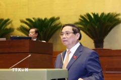 Thủ tướng Phạm Minh Chính trình bày Báo cáo của Chính phủ. (Ảnh: Phương Hoa/TTXVN)