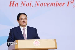 Thủ tướng Phạm Minh Chính chủ trì Hội nghị tham vấn các chuyên gia, tổ chức trong nước và quốc tế về thành lập Trung tâm tài chính quốc tế tại Việt Nam. (Ảnh: Dương Giang/TTXVN)