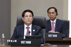 Chủ tịch nước Lương Cường dự Phiên họp thứ 2 Hội nghị Cấp cao APEC lần thứ 32 . (Ảnh: Lâm Khánh/TTXVN)