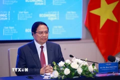 Thủ tướng Phạm Minh Chính tiếp các doanh nghiệp quốc tế về lĩnh vực tài chính. (Ảnh: Dương Giang/TTXVN)