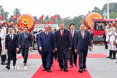 Tổng Bí thư Tô Lâm, các đồng chí lãnh đạo, nguyên lãnh đạo Đảng, Nhà nước dự Lễ kỷ niệm. (Ảnh: Thống Nhất/TTXVN)