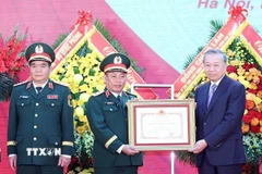 Tổng Bí thư Tô Lâm trao Huân chương Hồ Chí Minh cho lực lượng Tình báo Quốc phòng Việt Nam. (Ảnh: Thống Nhất/TTXVN)