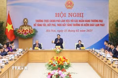 Thủ tướng Phạm Minh Chính chủ trì Hội nghị Thường trực Chính phủ làm việc với các ngân hàng thương mại. (Ảnh: Dương Giang/TTXVN)