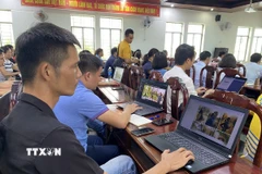 Lớp tập huấn AI cho giảng viên trường Đại học Thể dục Thể thao Đà Nẵng. (Ảnh: Xuân Quý/TTXVN)