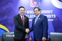 Thủ tướng Phạm Minh Chính gặp Tổng Thư ký ASEAN Kao Kim Hourn. (Ảnh: Dương Giang/TTXVN)