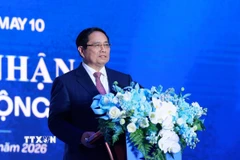 Thủ tướng Phạm Minh Chính phát biểu tại lễ kỷ niệm 80 năm thành lập Tổng Công ty May 10. (Ảnh: Dương Giang/TTXVN)