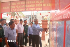 Công tác kiểm tra các điểm bầu cử trên xã đảo Nhơn Châu (tỉnh Gia Lai) được chuẩn bị kỹ lưỡng, sẵn sàng cho ngày hội của non sông. (Ảnh: Quang Thái/TTXVN)