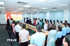 Lễ kết nạp Đảng cho đảng viên mới tại Đảng ủy Khu Công nghiệp Nhật Bản-Hải Phòng. (Ảnh Tiến Vĩnh/TTXVN)