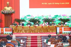 Đoàn chủ tịch chủ trì hội thảo khoa học xây dựng nền quốc phòng toàn dân vững mạnh, hiện đại. (Nguồn: Báo Quân đội Nhân dân)