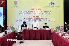 Quang cảnh hội thảo “Chia sẻ kinh nghiệm của Nhật Bản trong tổ chức thi hành pháp luật”. (Ảnh: Đỗ Bình/TTXVN)