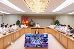 Phó Thủ tướng Trần Hồng Hà chủ trì cuộc họp. (Ảnh: Văn Điệp/TTXVN)