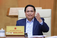 Thủ tướng Phạm Minh Chính chủ trì Phiên họp Chính phủ chuyên đề về Trung tâm Tài chính quốc tế tại Việt Nam. (Ảnh: Dương Giang/TTXVN)