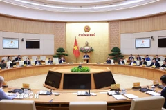 Thủ tướng Phạm Minh Chính chủ trì Phiên họp Chính phủ chuyên đề về Trung tâm Tài chính quốc tế tại Việt Nam. (Ảnh: Dương Giang/TTXVN)