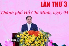 Thủ tướng Phạm Minh Chính phát biểu tại Lễ đón nhận danh hiệu Anh hùng Lực lượng vũ trang lần thứ 3 của Lực lượng vũ trang Thành phố Hồ Chí Minh. (Ảnh: Dương Giang/TTXVN)