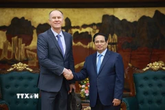 Thủ tướng Phạm Minh Chính tiếp ông Martin Sommer, Trưởng Đoàn giám sát kinh tế vĩ mô của Quỹ Tiền tệ quốc tế (IMF). (Ảnh: Dương Giang/TTXVN)