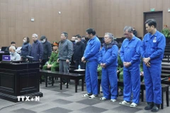 Các bị cáo tại phiên tòa ngày 26/1. (Ảnh: Kim Anh/TTXVN)