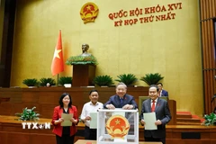 Tổng Bí thư Tô Lâm và đại biểu Quốc hội bỏ phiếu. (Ảnh: Doãn Tấn/TTXVN)