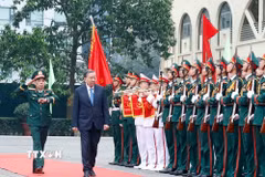 Lễ đón Tổng Bí thư Tô Lâm đến thăm và làm việc với Học viện Kỹ thuật quân sự. (Ảnh: Thống Nhất/TTXVN)