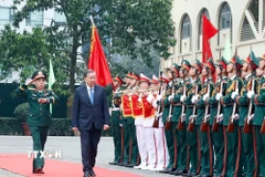 Lễ đón Tổng Bí thư Tô Lâm đến thăm và làm việc với Học viện Kỹ thuật quân sự. (Ảnh: Thống Nhất/TTXVN)