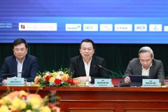 Hội thảo "Huy động hiệu quả nguồn vốn, phục vụ mục tiêu tăng trưởng hai con số," ngày 12/3. (Ảnh: Vietnam+)