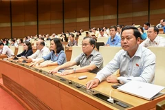 Quốc hội vừa chính thức thông qua Nghị quyết về thí điểm một số cơ chế, chính sách đặc thù phát triển nhà ở xã hội trong phiên họp ngày 29/5. (Ảnh: CTV/Vietnam+)