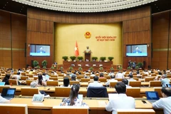 Sáng 14/6, Quốc hội đã biểu quyết thông qua Luật Thuế tiêu thụ đặc biệt (sửa đổi) với 448/454 đại biểu có mặt tán thành, đạt tỷ lệ 93,72%. (Ảnh: CTV/Vietnam+)