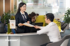 Thị trường đóng cửa, VN-Index tiệm cận mốc 1.700 điểm khi tăng 12,53 điểm lên đóng cửa ở 1.697,83 điểm. (Ảnh: Vietnam+)