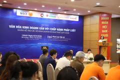 Hội thảo thúc đẩy văn hóa kinh doanh gắn với hỗ trợ hộ kinh doanh kê khai, nộp thuế quý 1/2026. (Ảnh: Vietnam+)