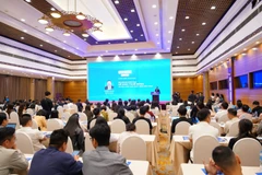 Hội thảo “Giải pháp giúp hộ kinh doanh kê khai thuế đúng, an tâm tuân thủ, phát triển bền vững." (Ảnh: Vietnam+)