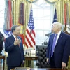 Tổng Bí thư Tô Lâm gặp Tổng thống Hoa Kỳ Donald Trump. (Ảnh: Thống Nhất/TTXVN)