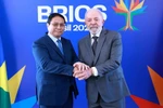 Thủ tướng Phạm Minh Chính và Tổng thống Cộng hòa Liên bang Brazil Lula da Silva. (Ảnh: Dương Giang/TTXVN)
