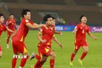 Minh Phúc số 21 ghi bàn ấn định tỷ số 3-2 cho U23 Việt Nam. (Ảnh: AFC/TTXVN phát)