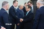Thủ tướng Phạm Minh Chính tiếp lãnh đạo Nhóm Nghị sỹ Hữu nghị Ba Lan-Việt Nam. (Ảnh: Dương Giang/TTXVN)