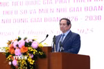 Thủ tướng Phạm Minh Chính phát biểu tại Hội nghị toàn quốc Tổng kết Chương trình mục tiêu quốc gia phát triển kinh tế-xã hội vùng đồng bào dân tộc thiểu số. (Ảnh: Dương Giang/TTXVN)