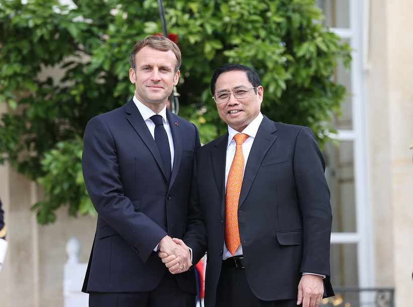 Thủ tướng Chính phủ Phạm Minh Chính và Tổng thống Cộng hòa Pháp Emmanuel Macron. (Ảnh: Dương Giang/TTXVN)