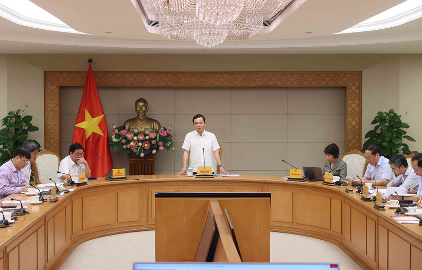 Phó Thủ tướng Trần Lưu Quang chủ trì họp triển khai Đề án 1 triệu hécta lúa chuyên canh vùng Đồng bằng sông Cửu Long. (Ảnh: An Đăng/TTXVN)