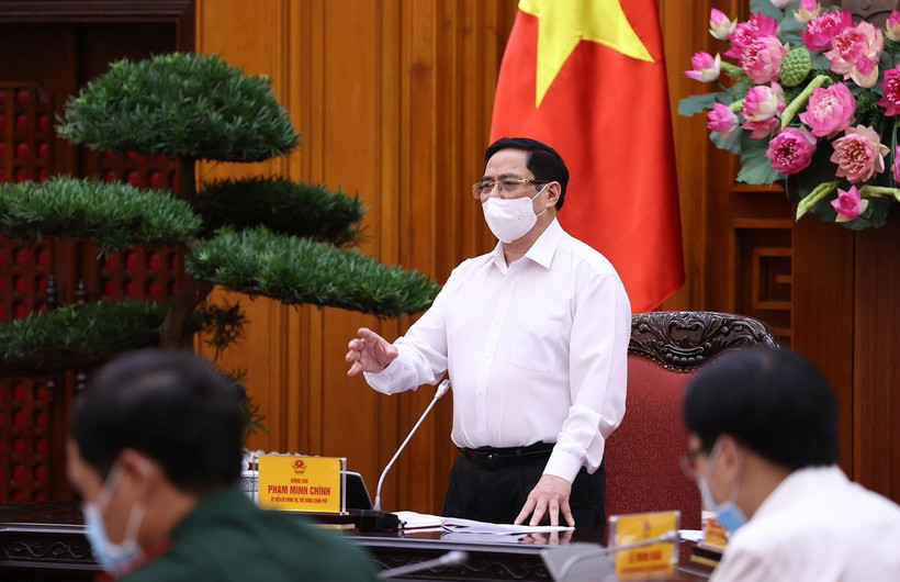 Thủ tướng Phạm Minh Chính yêu cầu thực hiện nghiêm túc các biện pháp phòng, chống dịch trong các khu công nghiệp. (Ảnh: Dương Giang/TTXVN)