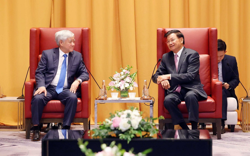 Tổng Bí thư, Chủ tịch nước Lào Thongloun Sisoulith tiếp đồng chí Đỗ Văn Chiến, Ủy viên Bộ Chính trị, Bí thư Trung ương Đảng, Chủ tịch Ủy ban Trung ương Mặt trận Tổ quốc Việt Nam. (Ảnh: Phạm Kiên/TTXVN)