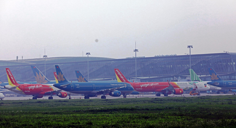 Các hãng hàng không vẫn chưa thể mở lại bay quốc tế do chờ ban hành bộ quy trình cách ly thống nhất. (Ảnh: Huy Hùng/Vietnam+)