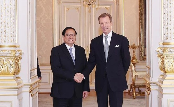 Thủ tướng Phạm Minh Chính hội kiến Đại Công tước Luxembourg Henri. (Ảnh: Dương Giang/TTXVN) 