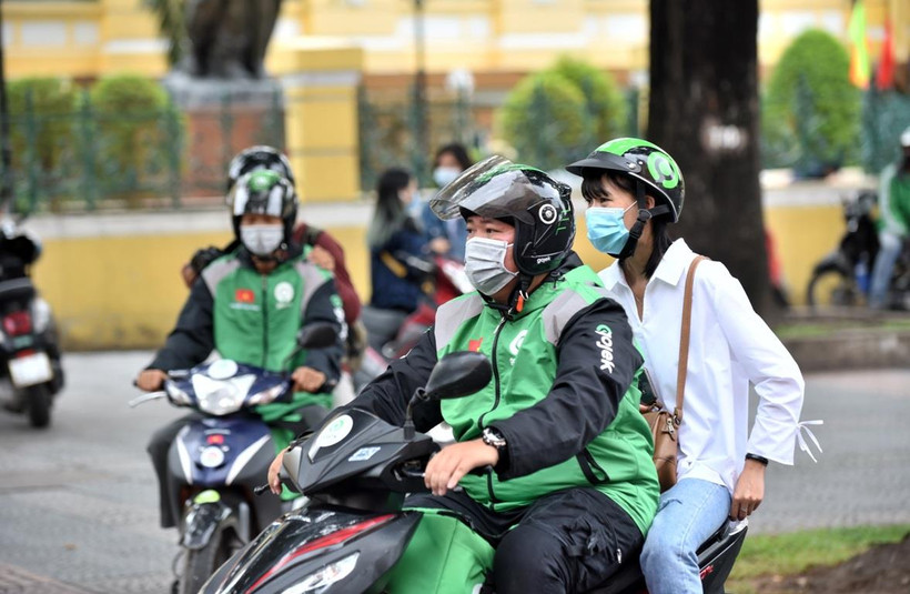 Gojek đưa ra chương trình chuyến xe đồng giá 8.000 đồng. (Ảnh: PV/Vietnam+)