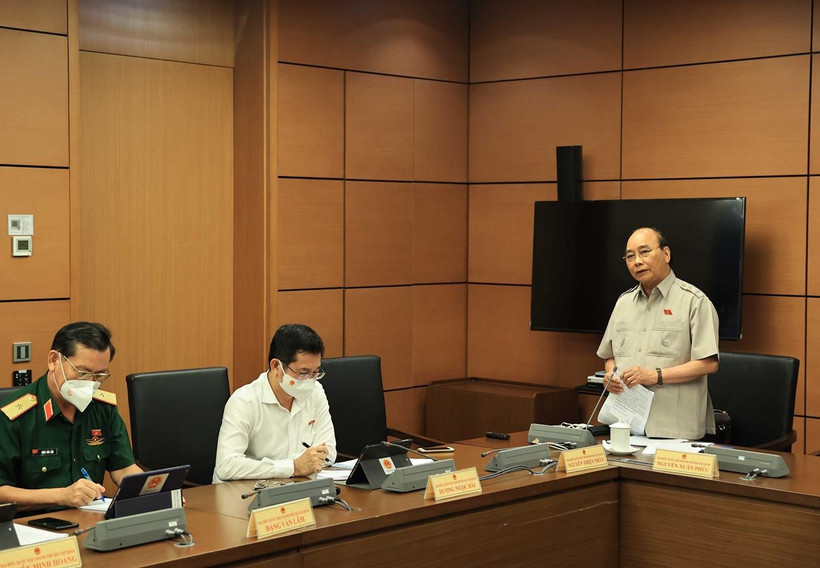 Chủ tịch nước Nguyễn Xuân Phúc phát biểu trong phiên thảo luận tại tổ. (Ảnh: Thống Nhất-TTXVN)