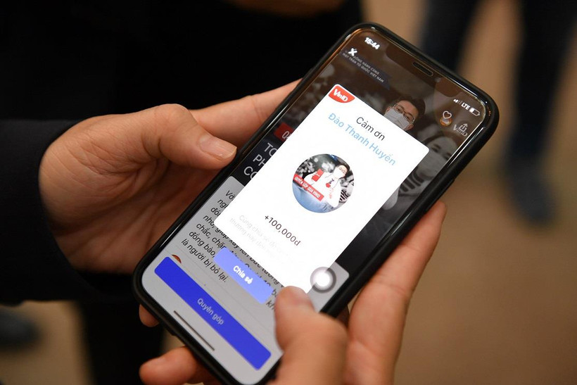 Từ nay người dân có thể dễ dàng quyên góp phòng, chống dịch Covid-19 qua VinID. (Nguồn: Vietnam+)